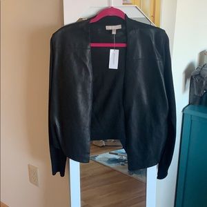 Leather and knit sweater.